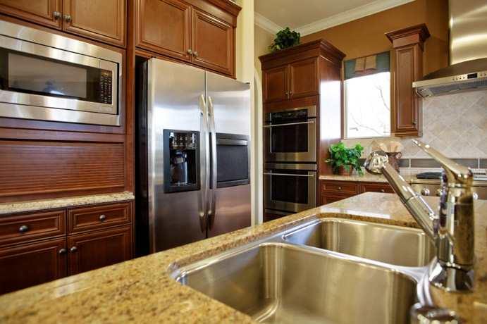 Granite Kitchen Countertop tan mahogany cabinets Northern Michigan MKD Kitchens, 